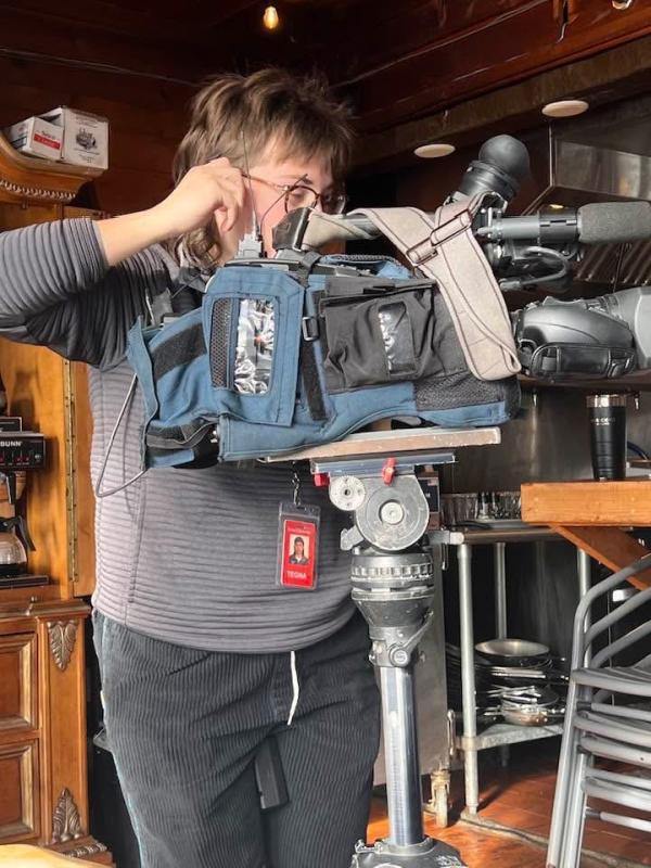 Videographer for "207," Scout sets up a camera. Billie Howard-Goldsmith photo Videographer for "207," Scout sets up a camera. Jen Mitchell photo