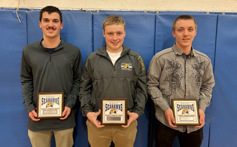Receiving plaques for their individual efforts during the 2024-2025 season were, from left, Aidric Canada, most improved; Tyson French, most valuable; and Lysander Lefevre, coaches award. KEVIN BURNHAM/Boothbay Register Plaque winners