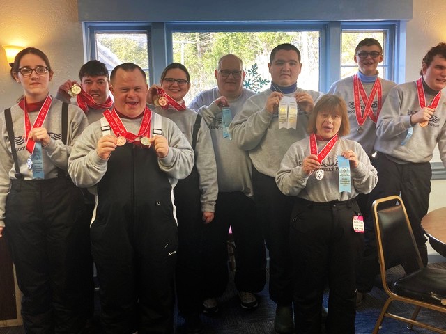 Boothbay Special Olympians display their ribbons. From left are Grace Giles, Joey Ranco, Danny Miller, Val Giles, Donny Dunning, Vincent Giles, Ronda LeConte, Deshawn Averill and Blake Chadwick. Courtesy photo Boothbay Special Olympians