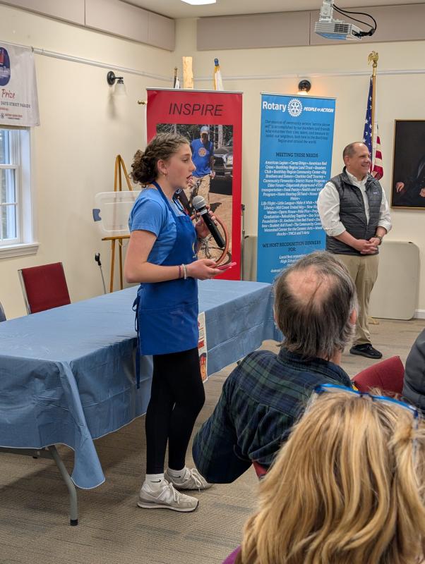 Abigail Clark, Interact president, speaks of the club's accomplishments and upcoming efforts. CANDI JONETH/Boothbay Register Spaghetti Dinner