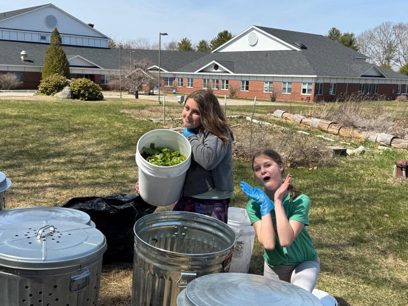 Sixth grade helpers Briar, daughter of Arianna and Brice Johnson, and Lilianna, daughter of Trista and Brian Cassidy, dump leftovers from Friday’s salad bar into the compost bins next to Edgecomb Eddy School gardens. Students are residents of Alna and Edgecomb. Courtesy photo Sixth grade helpers Briar, daughter of Arianna and Brice Johnson, and Lilianna, daughter of Trista and Brian Cassidy, dump leftovers from Friday’s salad bar into the compost bins next to Edgecomb Eddy School gardens. Students are residents of Alna and Edgecomb. Courtesy photo