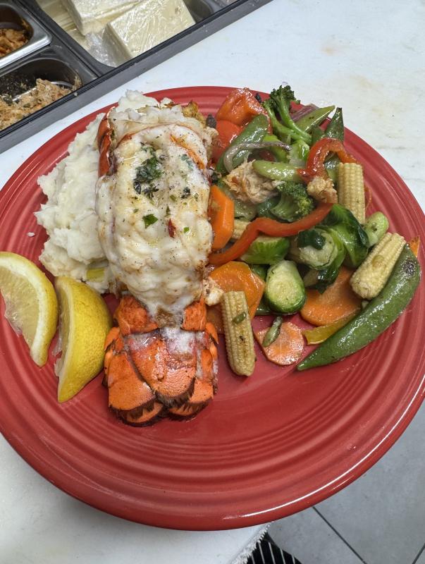 Crab imperial stuffed lobster tail at Mine Oyster. Ralph Smith photo Seafood