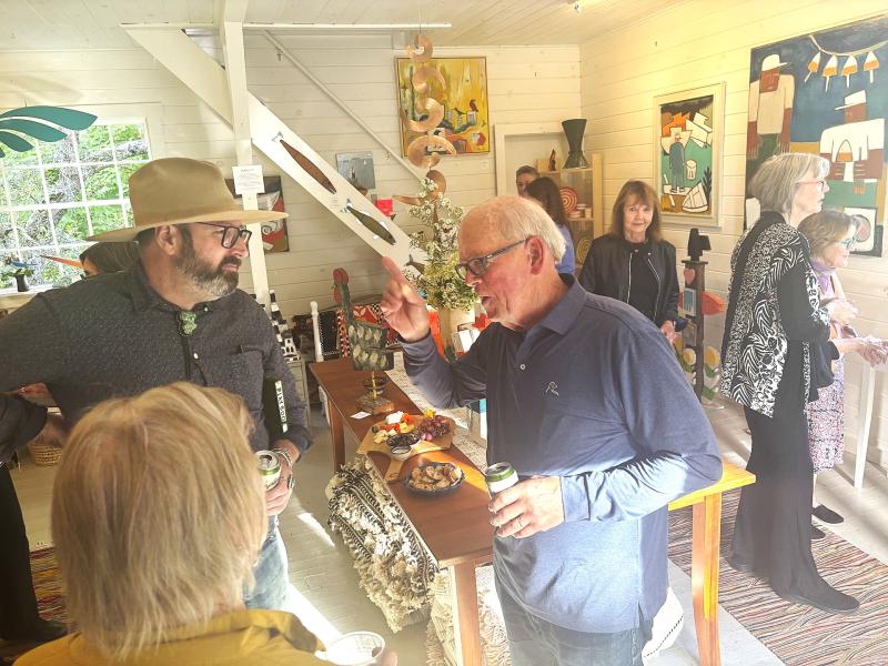 Dick Alden, right, Matt Barter, left, and Priscilla Alden talking art, of course. LISA KRISTOFF/Boothbay Register LISA KRISTOFF/Boothbay Register