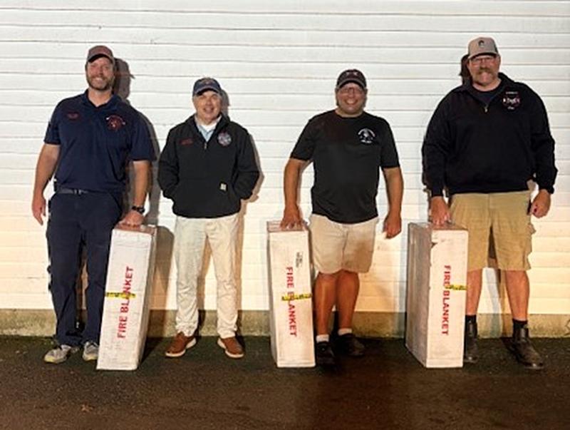 Boothbay Region Lions Club purchased three EV blankets and presented them to the Boothbay Harbor Fire Dept., Boothbay Fire Dept. and Southport Fire Dept. The pic was taken during the Fire Prevention event on Oct. 7. Accepting the blankets with Lions Club member Glenn Tilton, second from left, are Tim Pinkham, asst. chief, Boothbay Fire; Nick Upham, chief, Boothbay Harbor Fire; and Adam Harkins, asst. chief, Southport Fire. Courtesy photo
Boothbay Region Lions Club purchased three EV blankets and presented them to the Boothbay Harbor Fire Dept., Boothbay Fire Dept. and Southport Fire Dept. The pic was taken during the Fire Prevention event on Oct. 7. Accepting the blankets with Lions Club member Glenn Tilton, second from left, are Tim Pinkham, asst. chief, Boothbay Fire; Nick Upham, chief, Boothbay Harbor Fire; and Adam Harkins, asst. chief, Southport Fire. Courtesy photo