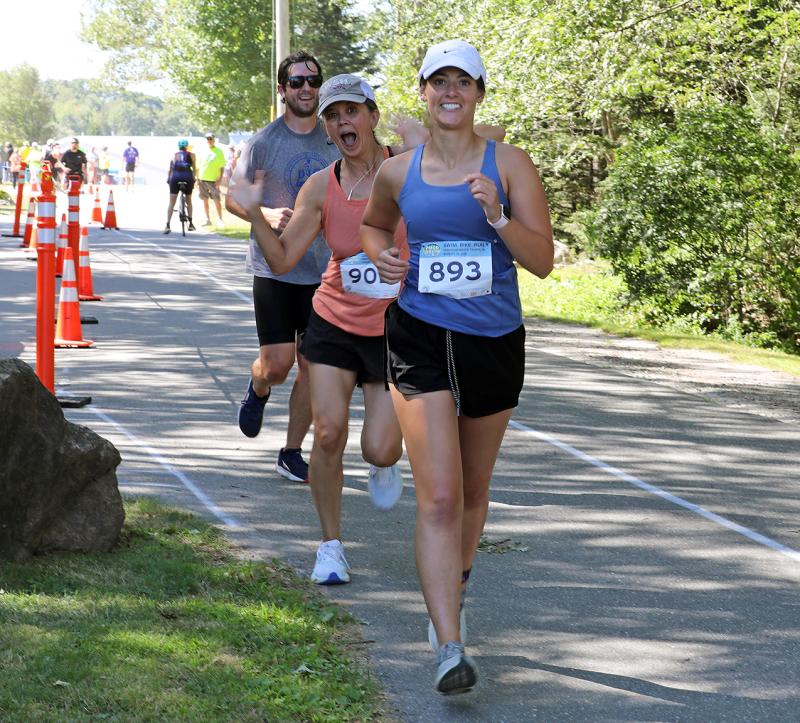 Participants begin their run with attitude during the 2025 Pemaquid Beach Triathlon. Photo by Kris Christine