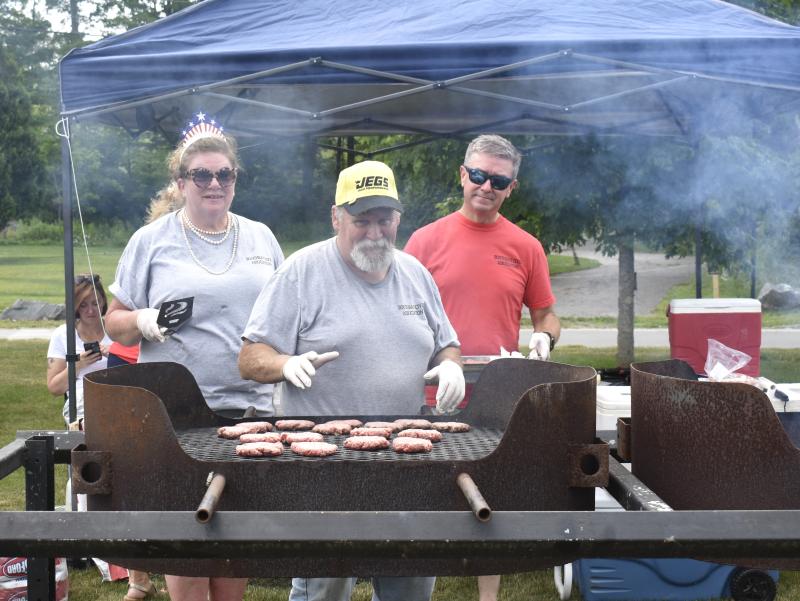 Grillmaster Martin Page with Lisa Walby and Ben Rankins. LISA KRISTOFF/Boothbay Register