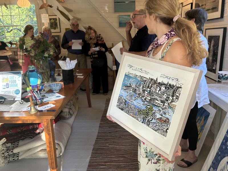 Bidding began with a Philippe and Kim Villard a painted woodcut at the Kerr + Jones Artful Auction to benefit the CRC. LISA KRISTOFF/Boothbay Regist