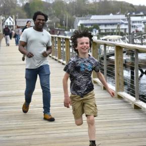 A young attendee races to the finish line during Bigelow Laboratory's 9th annual Fun Run & Walk for Colorectal Cancer Awareness. ISABELLE CURTIS/Boothbay Register