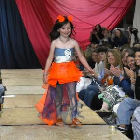 Harper Casey, 6, makes her runway debut in an outfit inspired by her father's lobster buoys.  ISABELLE CURTIS/Boothbay Register