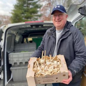 Carl Gluek picks up some garlic for the Boothbay Region Food Pantry. Courtesy photo