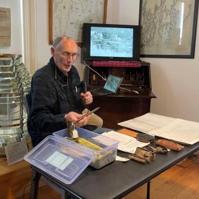 Sailmaker Nat Wilson presents several tools of the trade during a talk at the Boothbay Region Historical Society Feb. 18. FRITZ FREUDENBERGER/Boothbay Register