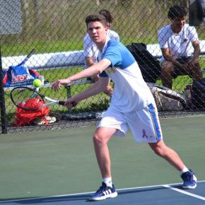 Harry Hinckley, playing first doubles with Ronan Drage, sets to return a serve against North Yarmouth Academy on May 19. KEVIN BURNHAM/Boothbay Register