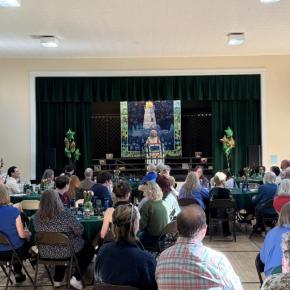 CTL's founder Nancie Atwell speaks to a crowd of alumni and current families in the school's auditorium. Courtesy photo