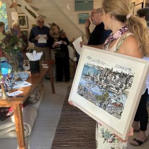 Bidding began with a Philippe and Kim Villard a painted woodcut at the Kerr + Jones Artful Auction to benefit the CRC. LISA KRISTOFF/Boothbay Regist