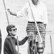 Kennedy enjoys a sail aboard the 62’ Coast Guard training yawl The Manitou. Standing, right, and chosen to take Kennedy's Senate seat vacated for the presidency is his Harvard roommate Ben Smith of Massachusetts. Courtesy of Tom Carbone Archives