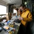 Dr. Steve Archer processes water samples on the Discovery, North Atlantic, summer 2011. Courtesy of Seb Hennige