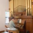 Mitch Boucher practices at the organ for his performance for the Champagne of the Sheepscot. Courtesy of Sheepscot Valley Conservation Association