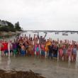 Participants in the Arthur Hale Veasey Memorial Regatta pose, victoriously exuberant, at the close of competition in Spring Cove at Squirrel Island on August 21. The regatta has been held in memory of its founder, Arthur Hale Veasey, at the island each summer since its inception over 70 years ago.