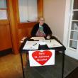 June Phillips mans the St.Andrews petition table in the town office lobby.