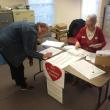 Kerri Kelley signs the St. Andrews petition after voting at the Boothbay Town Office. As of 12:45 p.m., over 771 signatures from four towns have been collected.  