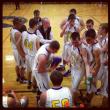 Coach L.J. Pinkham talks shop with the team before the start of the fourth quarter. BEN BULKELEY/Boothbay Register
