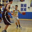 Joseph DiMauro, right, picks his spot against Monmouth. The younger DiMauro finished with 4 points. BEN BULKELEY/Boothbay Register