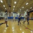 Abby McLellan grabs a high flying pass as Sarah Caron cuts down the middle.  RYAN LEIGHTON/ Boothbay Register 