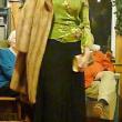 Marie MacDonald is ready for a night out in a vintage mink coat selling for $275, and a bright green top and skirt together retailing at $175, selling for $53. KATRINA CLARK/Boothbay Register