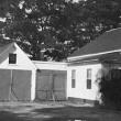 This shot, from the 1961-1962 Boothbay Town Report, shows the south side of the 1848 town hall when it was still at Boothbay Center. The little addition is the 1885 town office. Behind is the small garage, large enough for a couple of vehicles, but not for the town's large snowplow/sand trucks, loaders or grader.