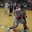 Shawn Simmons drives to the basket. The junior forward scored seven points for Boothbay. RYAN LEIGHTON/Boothbay Register