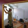 Toby Densmore from Campbell Woodworks works on the new archway connecting both sides of Eventide. KATRINA CLARK/Boothbay Register