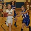Morgan Crocker drives to the basket against Oak Hill's Danielle Samson. KEVIN BURNHAM/Boothbay Register