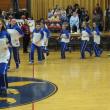 The Lady Seahawks make their entrance into Porter Memorial Gymnasium led by senior captain Sarah Caron.  