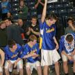 Sophomore John Hepburn holds up the Harry Edwards award after being named the outstanding player of the tournament. KEVIN BURNHAM/Boothbay Register 