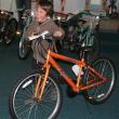Charlie Moss shows his pleasure in earning one of the 21 bicycles from area Masons through the summer reading program offered at the Boothbay Harbor Memorial Library. KEVIN BURNHAM/Boothbay Register