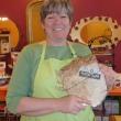 Owner Denise Demeter holds a Food Slab board, one of the many new products being sold at Eventide Artisan Bread & Cheese. KATRINA CLARK/Boothbay Register