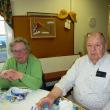Bawn Clifton, left, and Bill Koutzmann relax after enjoying slices of Pastor Sarah Foulger’s blueberry pie. KATRINA CLARK/Boothbay Register