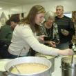 Kelsy Hartley decides on one of the 20-plus soups, chowders and stews donated for this year's fundraising event. LISA KRISTOFF/Boothbay Register