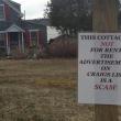 Concerned neighbors put this sign up in front of this Roads End property last week to warn people the rental listing for it on Craigslist is a scam. LISA KRISTOFF/Boothbay Register