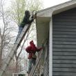 Bill Hamblen and Derek Abbot make repairs at a house on King Phillips Trail. SUE MELLO/Boothbay Register