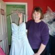 Cheryl Lorrain shows off one of the many free dresses available for local girls to wear to prom. KATRINA CLARK/Boothbay Register