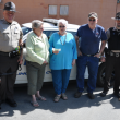 The Rotary Club of Boothbay Harbor presents Katharine Martin-Savage with a check for $1,000 for the Heidi Fund, which is used to purchase new dogs for the Lincoln County Sheriff's Office. From left: Sergeant Alan Shea, Debbie Graves, Katharine Martin-Savage, Daren Graves and Detective Scott Hayden. BEN BULKELEY/Boothbay Register