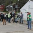 Sally Barter gives initial directions to the crew assembled at the catholic church's parking lot at 7:30 a.m. The high school softball team is pictured at left. SUE MELLO/Boothbay Register