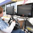 Mariah Mann, 15, tries driving in a NASCAR simulator. BEN BULKELEY/Wiscasset Newspaper 