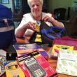 Burge with some of the items in the “Gifts For Learning” for children on the peninsula ages 4 through 12. LISA KRISTOFF/Boothbay Register