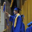 Class marshal Daniel Murray flashes a smile as his classmates arrive on the stage. BEN BULKELEY/Boothbay Register