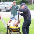 Herb Reno, 46, of Bath is loaded into a gurney after falling off a 25 foot roof. RYAN LEIGHTON/Boothbay Register
