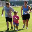 Running may not sound fun to some, but this young girl’s face says it all as she approaches the finish line during the kids’ fun run. SUE MELLO/Boothbay Register