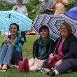 Wiscasset Area Chamber of Commerce board vice chairman Sherri Dunbar, left, Hope Mowry of Auburn and Wiscasset Town Manager Laurie Smith take the rain in stride at Lynn Deeves' installment of the “Alive on the River” concert series. Last week's concert overlapped with the Wiscasset Art Walk, providing one more thing for visitors to enjoy. SUSAN JOHNS/Wiscasset Newspaper