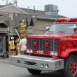 Boothbay firefighters inspect the malfunctioning air conditioner behind the gas station. RYAN LEIGHTON/ Boothbay Register